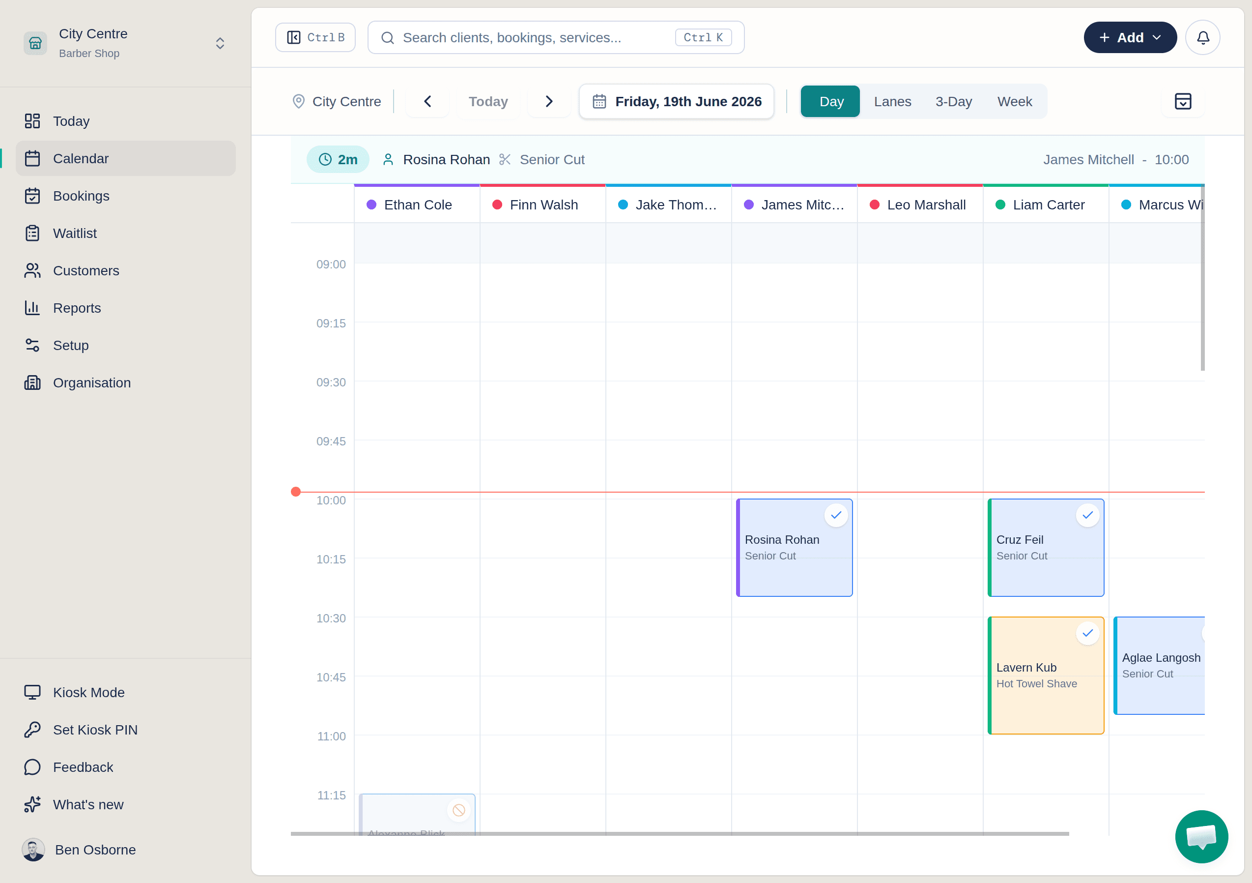 Setora calendar day view showing barber columns, bookings, walk-ins, and schedule controls